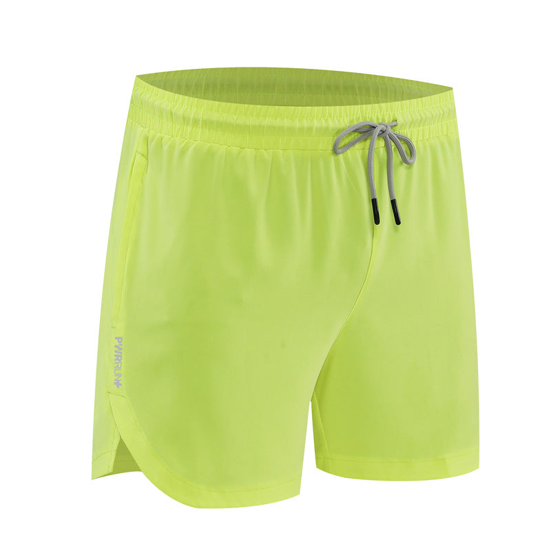 Yellow shorts with a drawstring on a white background