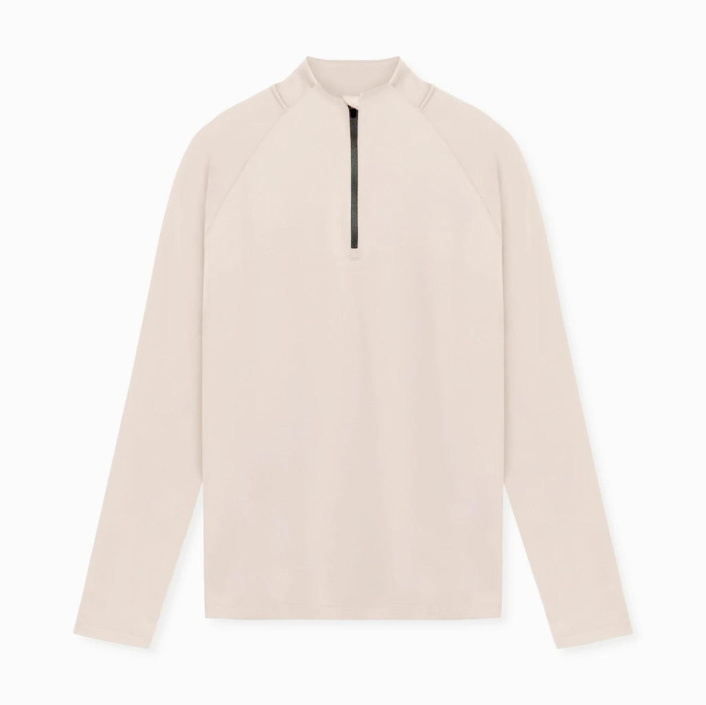 Beige long-sleeve shirt with a quarter zip on a white background