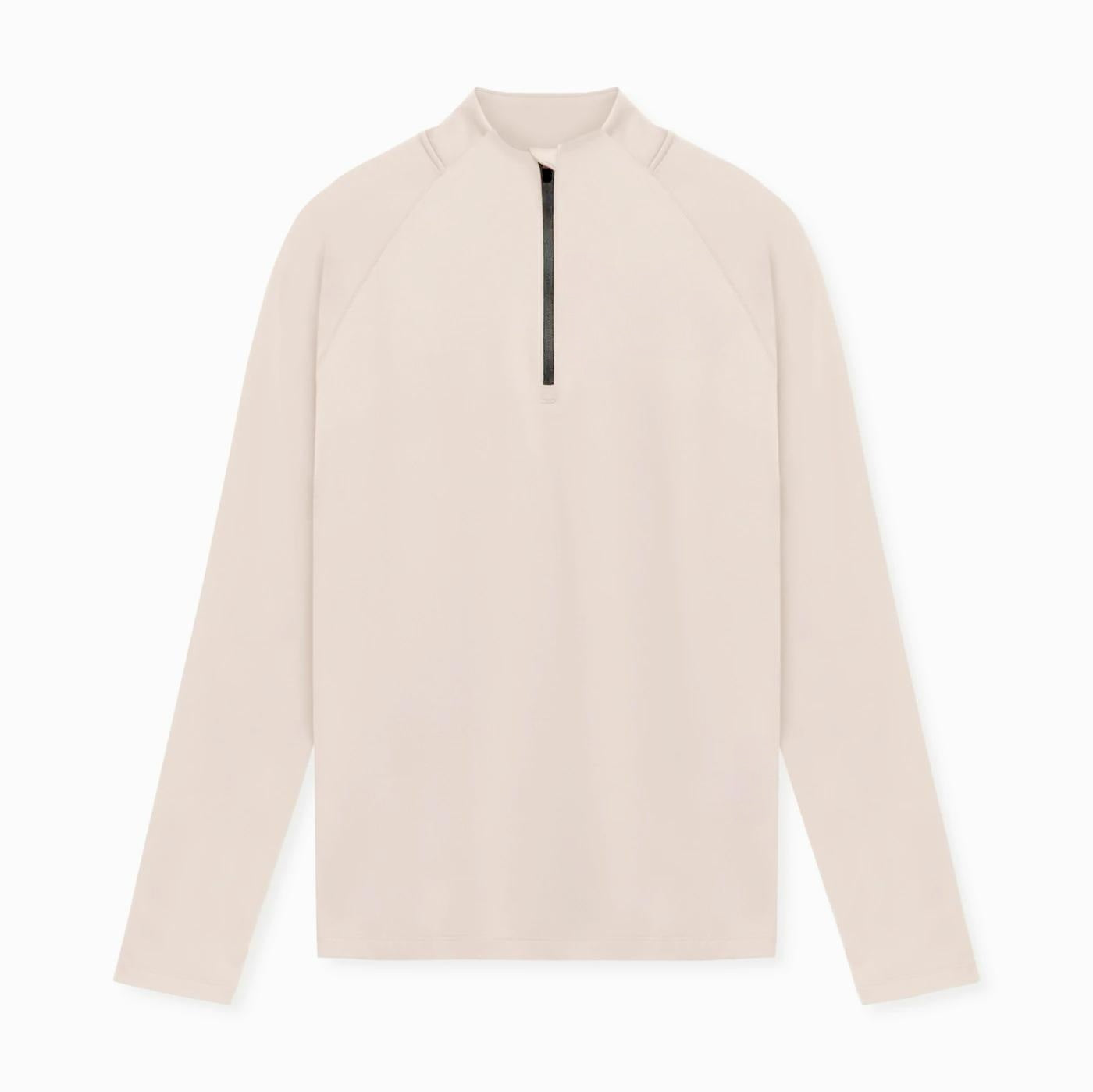 Beige long-sleeve shirt with a quarter zip on a white background