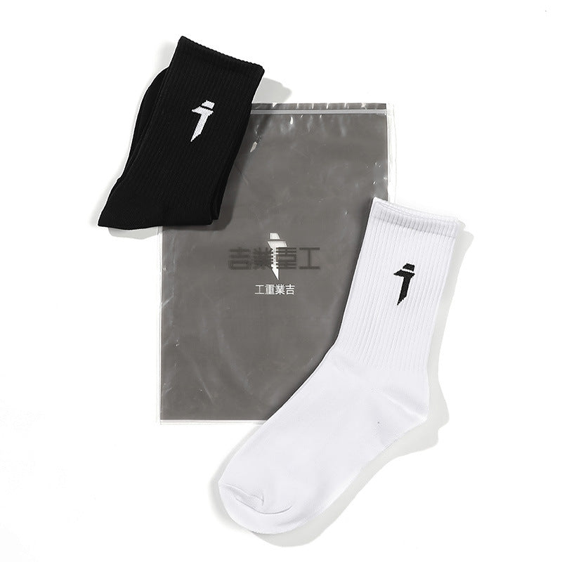 Black and white socks with a logo on a white background