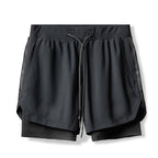 Black shorts with a drawstring on a white background
