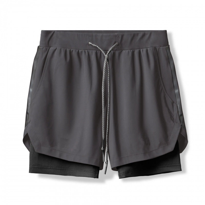 Dark gray shorts with a zipper on a white background