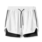 White athletic shorts with black accents on a white background