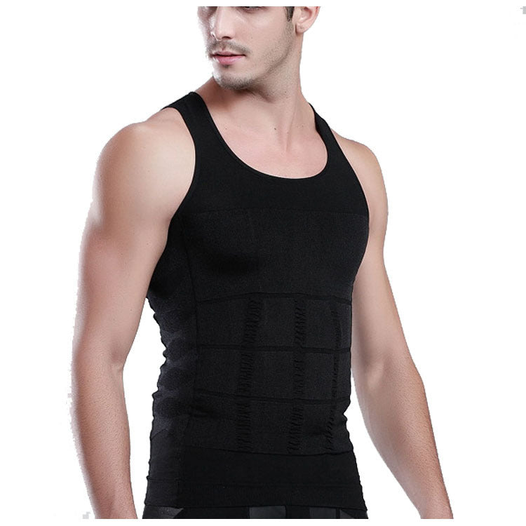 Man wearing a black compression tank top on a white background