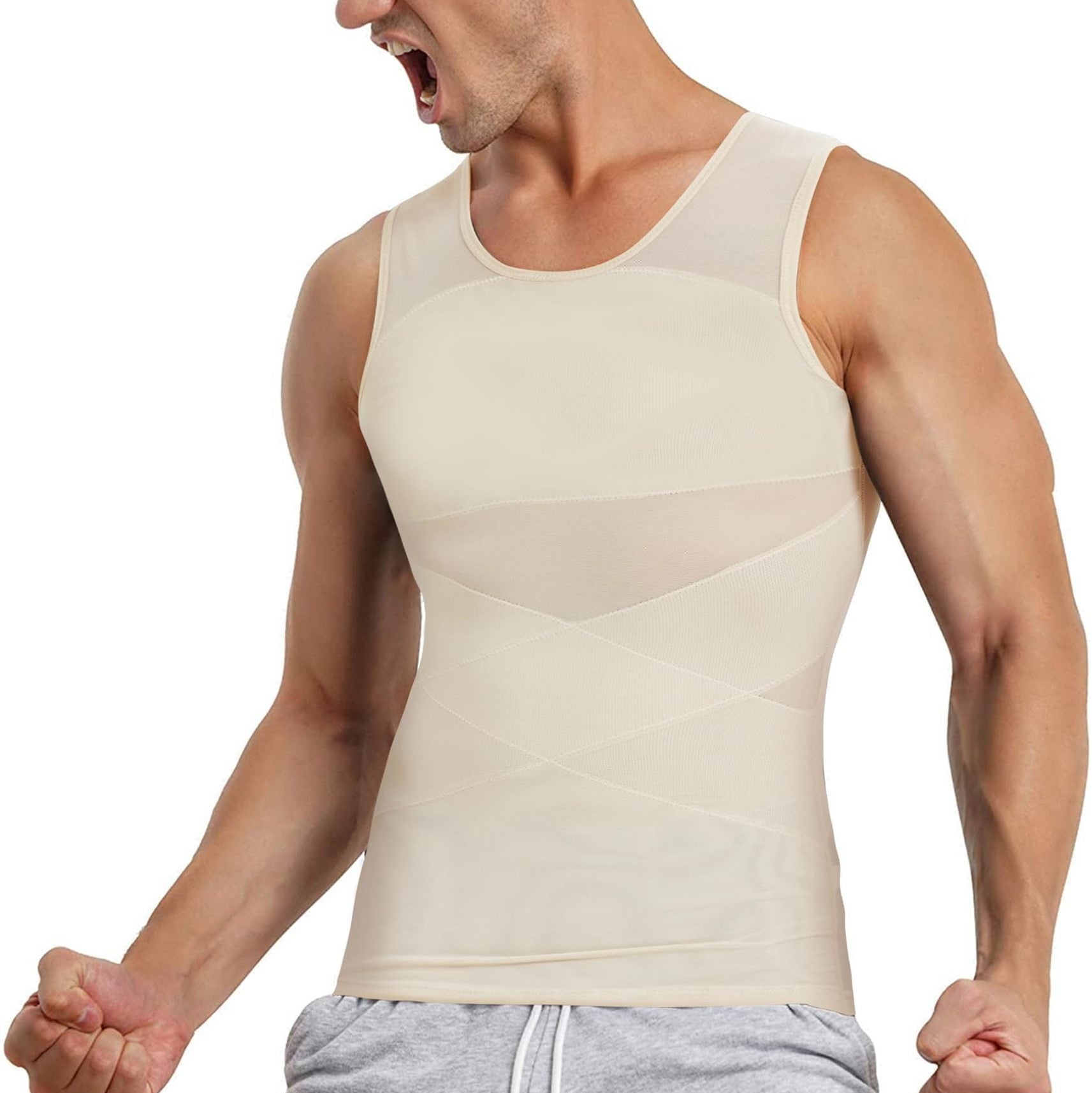 Man wearing a beige compression tank top on a white background