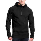 Black hoodie worn by a person on a white background