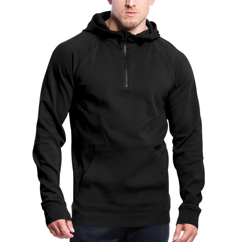 Black hoodie worn by a person on a white background