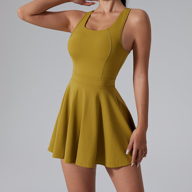 Yellow dress worn by a model on a gray background