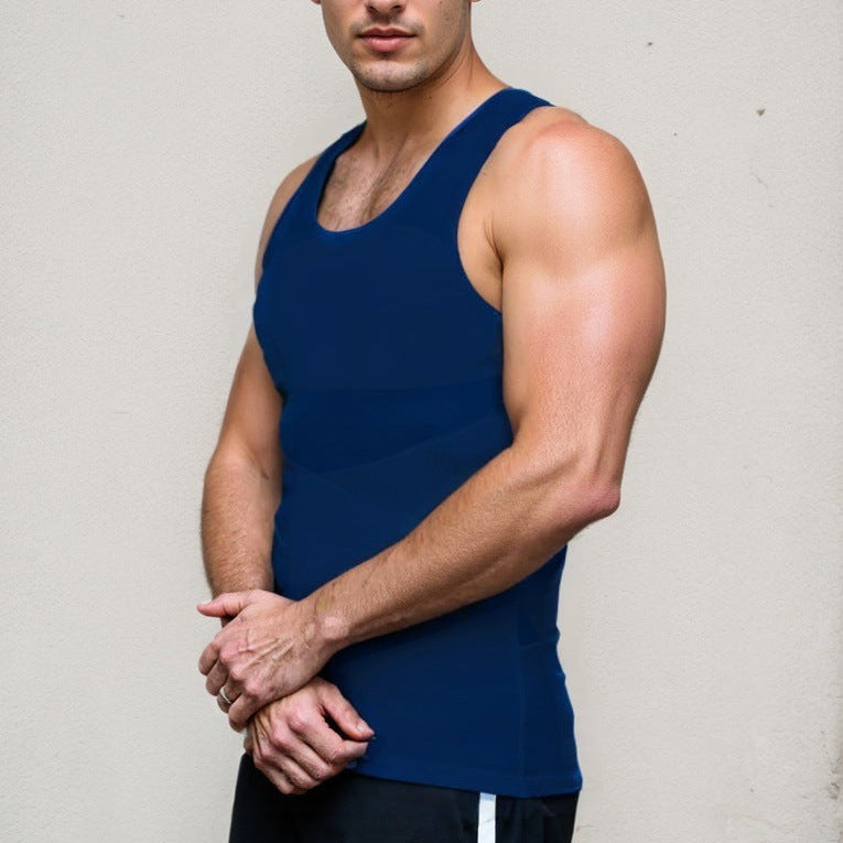 Man wearing a blue tank top against a plain background