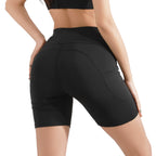 Person wearing black athletic shorts on a white background