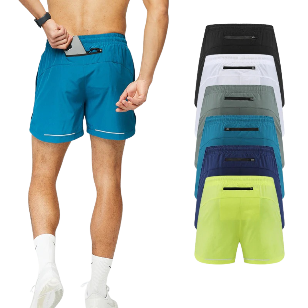 Stack of colorful shorts with a person wearing blue shorts on a white background