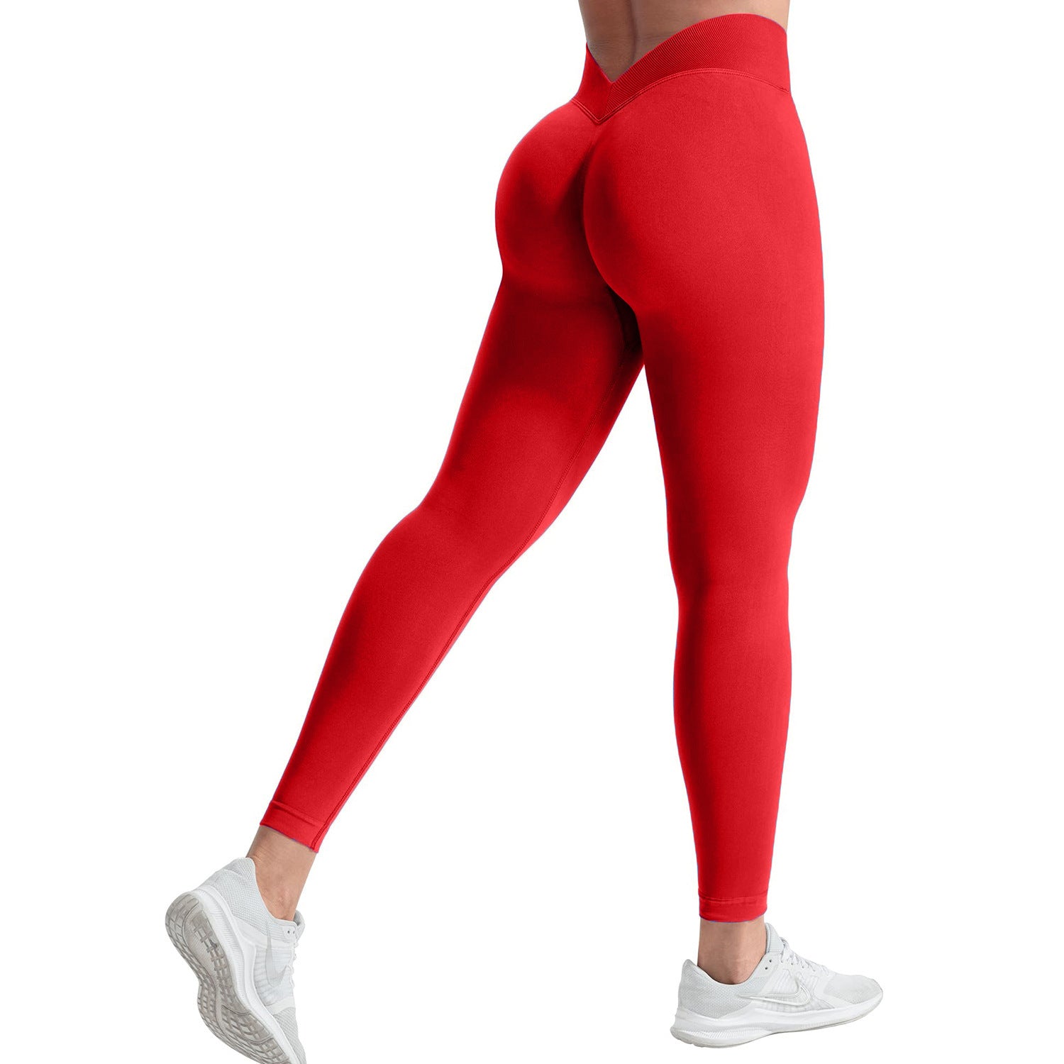Red leggings worn by a person on a white background