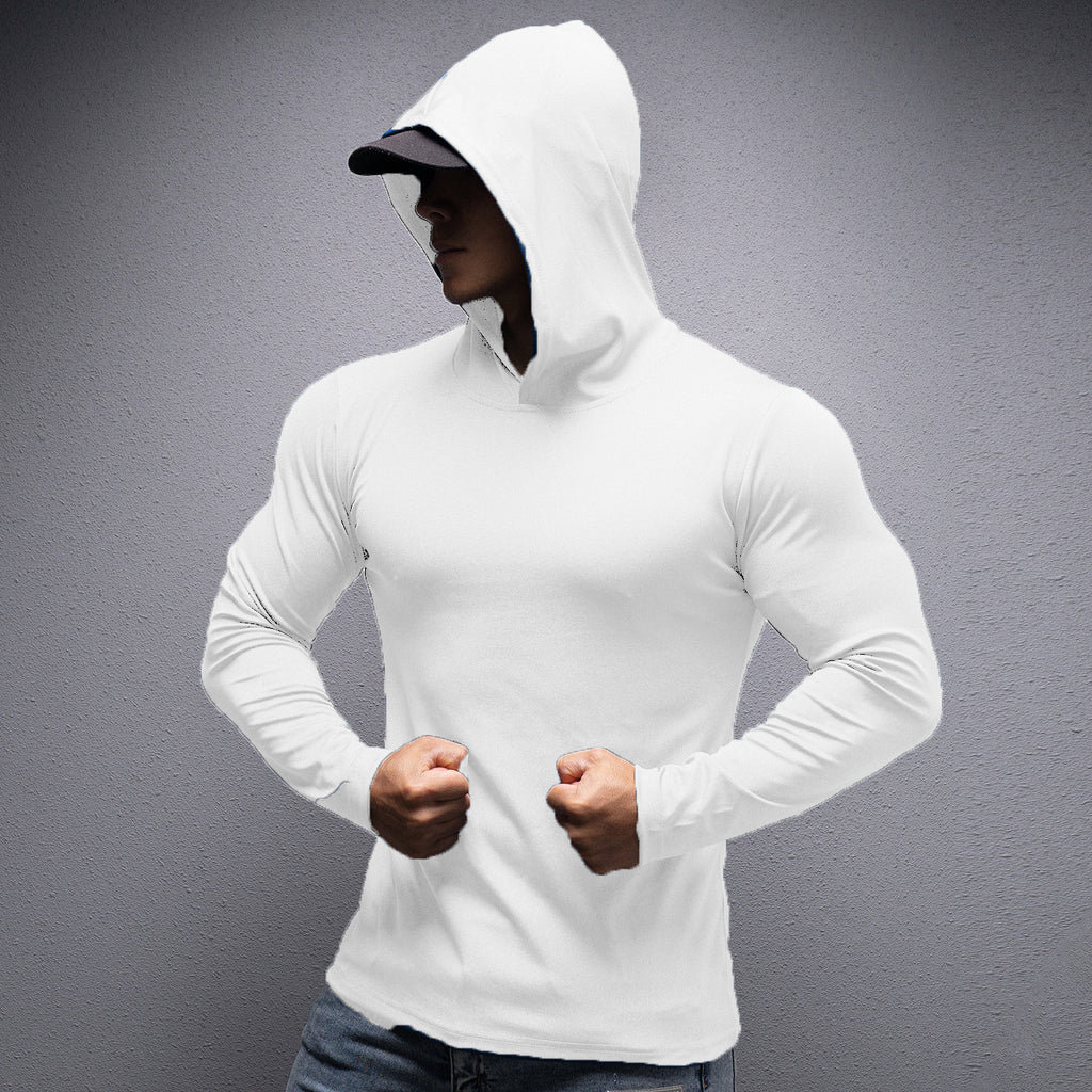 Person wearing a white hoodie against a gray background